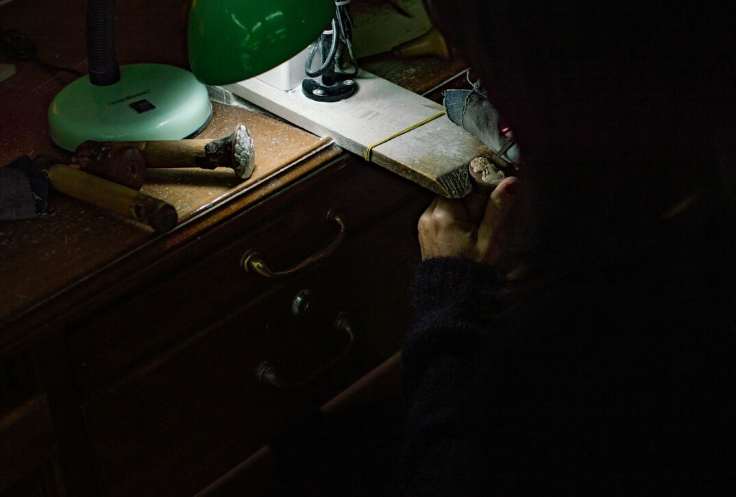 detective examining evidence at night